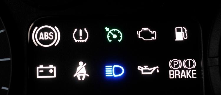 Car's dashboard lights meaning explained with icons, including a lit-up high beam light.